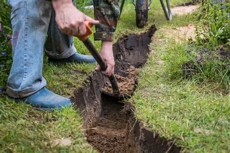 digging a drainage ditch